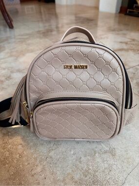Steve Madden Taupe Quilted Mini Backpack with Tassel